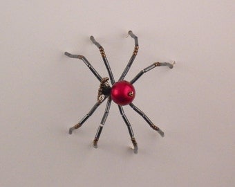Red and black beaded spider - home decor
