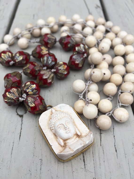 Items similar to Red and White Buddha Necklace on Etsy