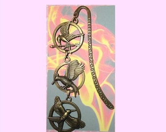 The HUNGER GAMES Inspired Three Pendant Bookmark Book Mark Mockingjay Catching Fire Arrow Bronze Gold Pin Katniss Peeta