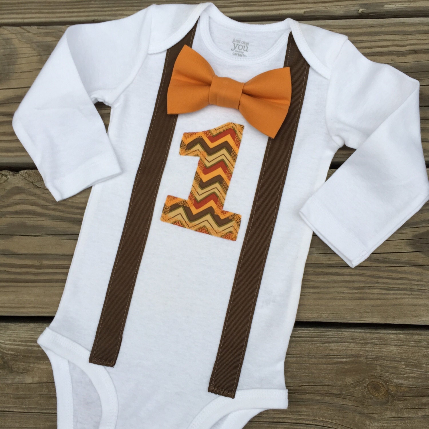 First birthday bow tie and suspenders onesie by IolaFernCustomBaby