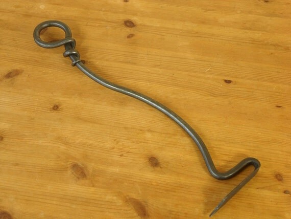 Wrap handled Fire Rake a versatile and elegant handmade fire