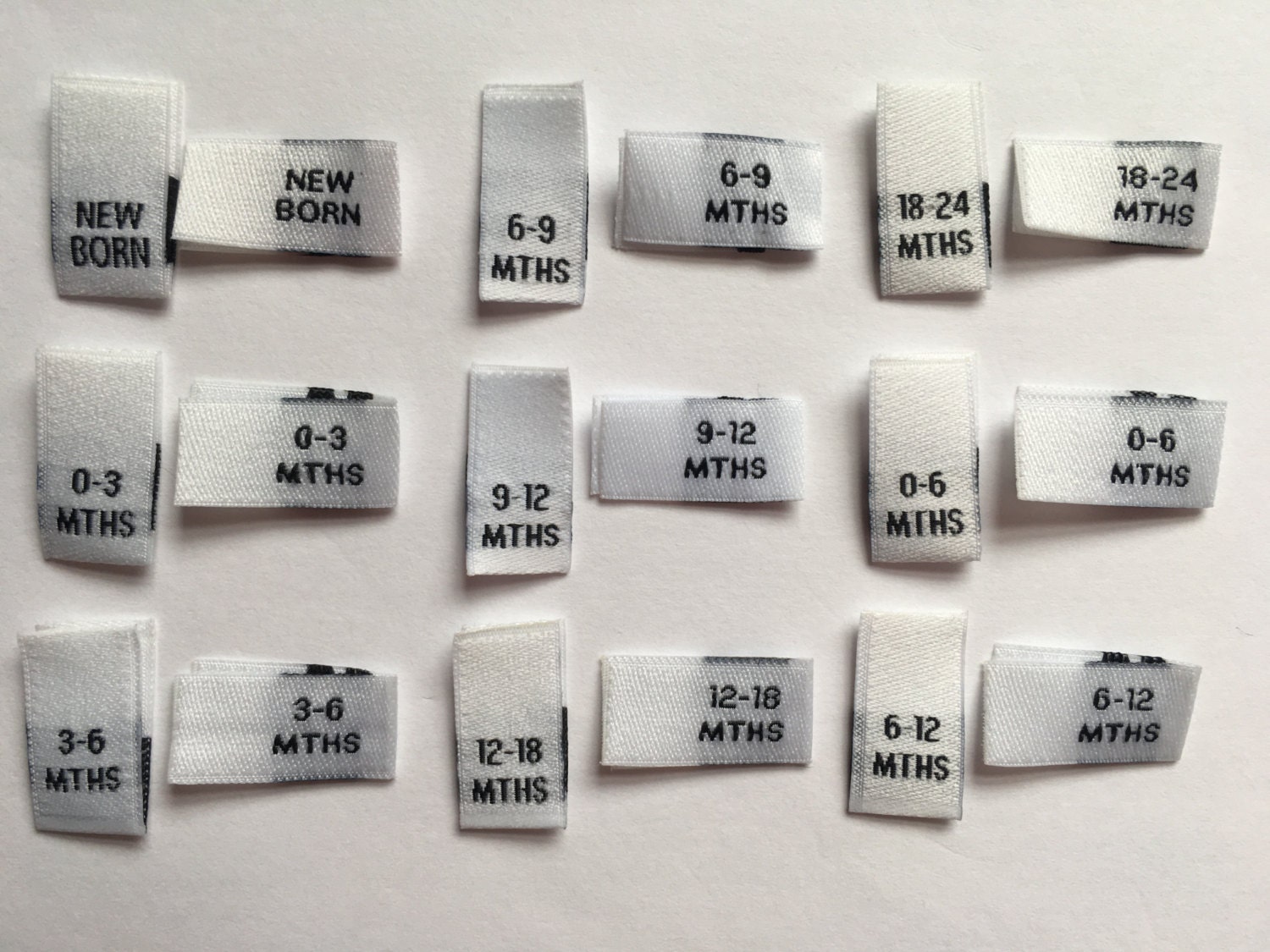 Baby WHITE Woven Size Pips Labels New Born 0-3 3-6 6-9 9-12 12-18 0-6 6 ...
