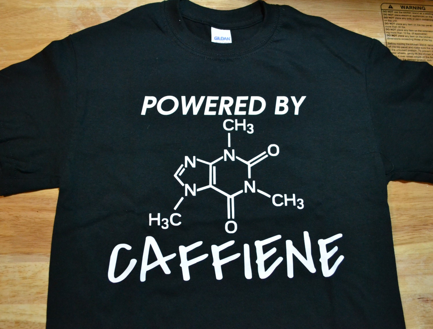 powered by caffeine t shirt