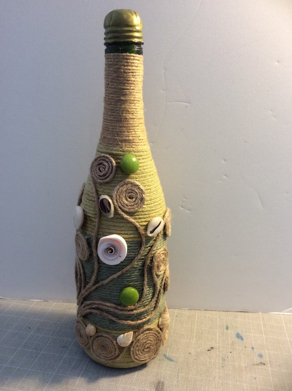 Multi Colored Twine Wrapped Wine Bottle