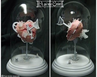 Heart of Golem under glass Bell mechanical mechanical heart