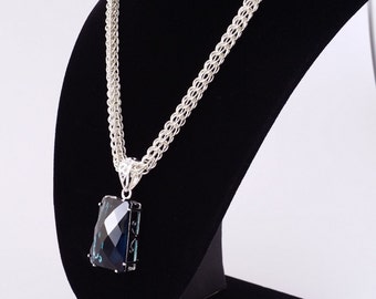Blue topaz pendant set in silver on silver full persian weave chainmaille necklace