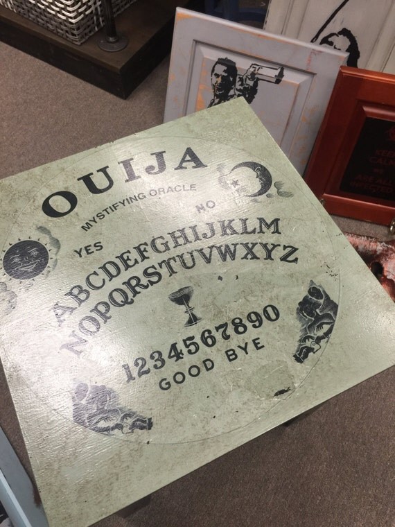 very strange custom made seance table ouija board