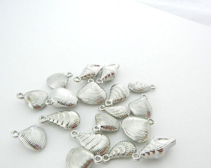 18 Dimensional Variety Seashells in Silver-tone Acrylic