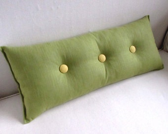 decorative lumbar pillow in PEAR GREEN with yellow buttons