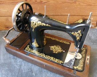 Fab the Morton, Manual sewing machine,in great condition with gold decals.Free UK postage