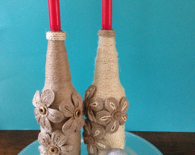 Twine wrapped recycled bottles with twine flowers, Christmas candle holders