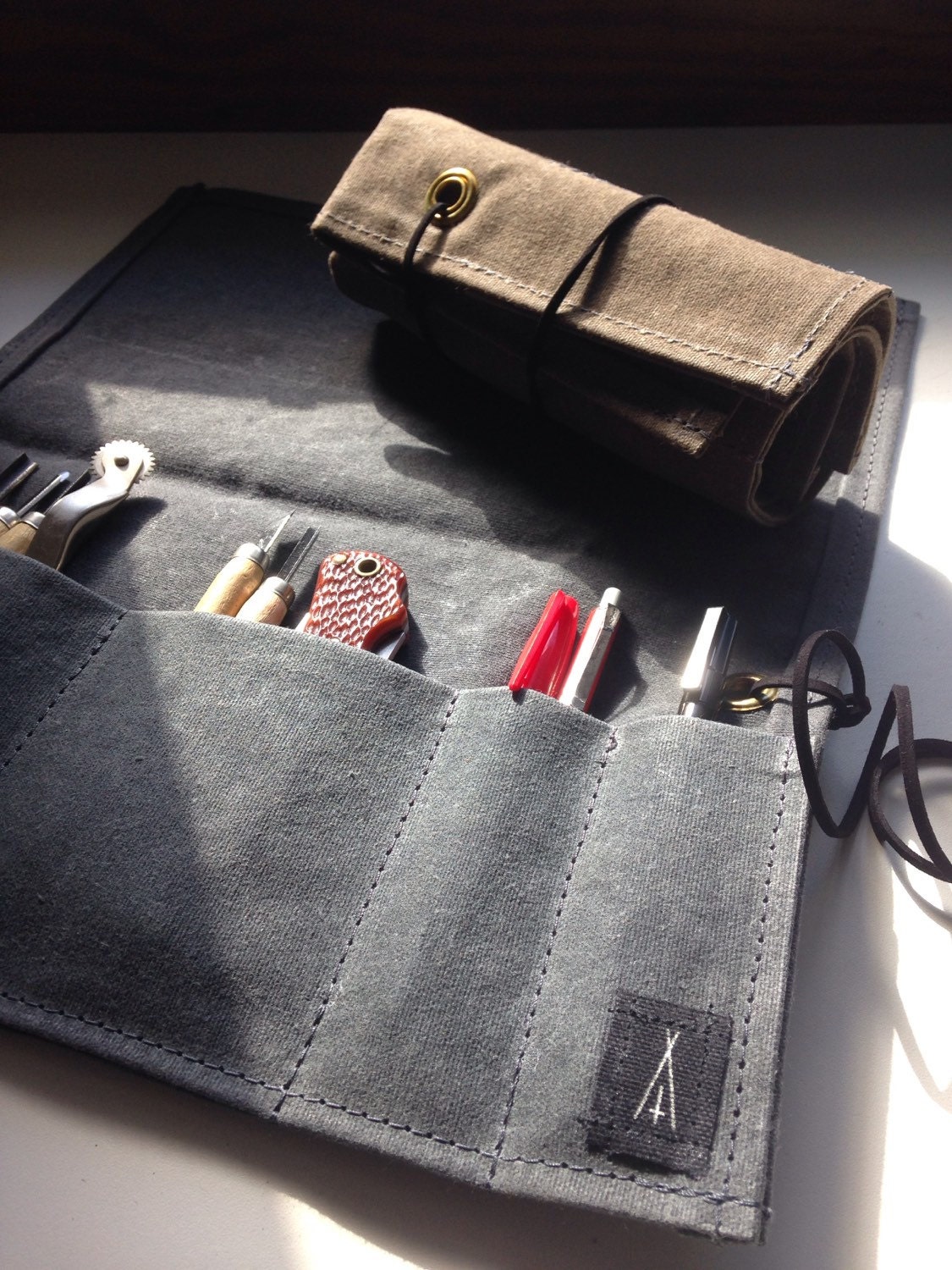 Tool roll up pouch in waxed canvas Volcano Goods