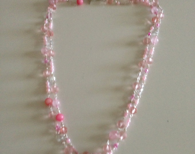 hand beaded pink, silver and white necklace made of quartz, rhodonite, and glass