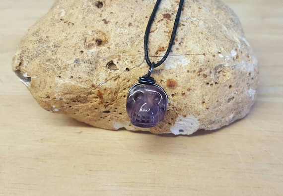 Crystal skull necklace. Carved Amethyst by empoweredcrystals
