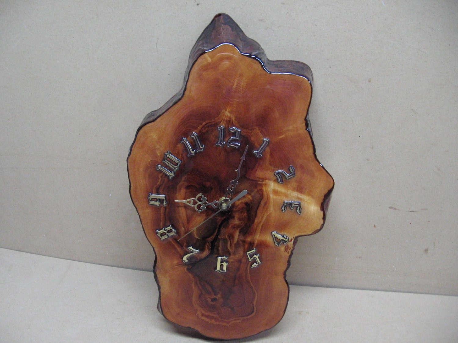 Tall narrow cypress clock with beautiful color.