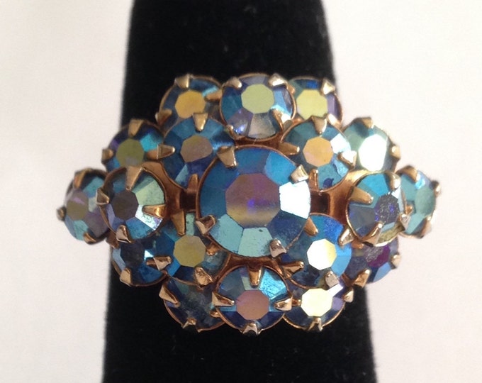 Storewide 25% Off SALE Vintage Gold Tone Iridescent Blue Cluster Rhinestone Designer Cocktail Ring Featuring Prong Set Faceted Design