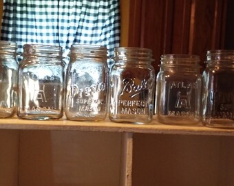 Six vintage pint sized canning jars