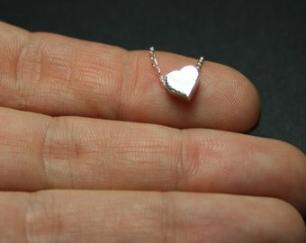 Tiny heart necklace. Sterling silver floating heart bead necklace.Delicate necklace. Bridesmaid necklace. Minimalist jewelry. Gift for her