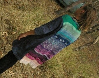 Blue sweater dress with rainbow back