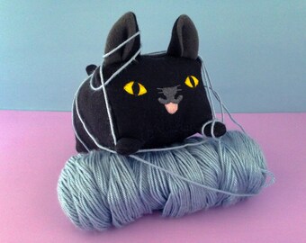 black kitty stuffed animal