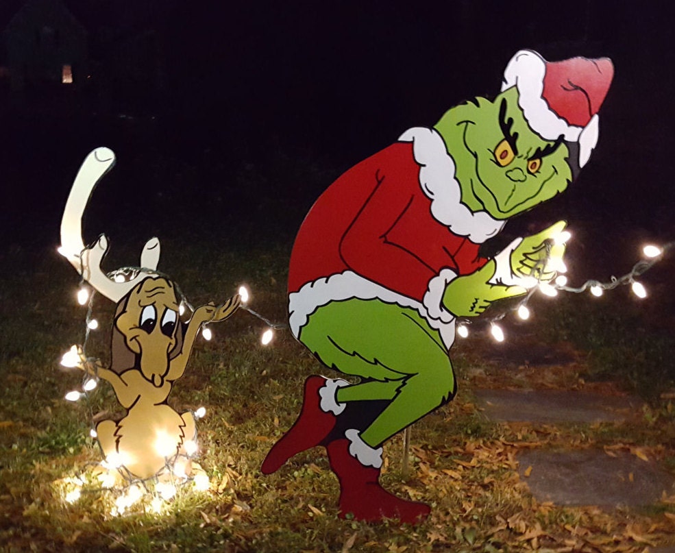 The Grinch and Max stealing Christmas yard art by HashtagArtz