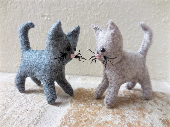 small stuffed cats