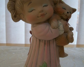 ceramic girl tot Christmas morning figurine holding kitty