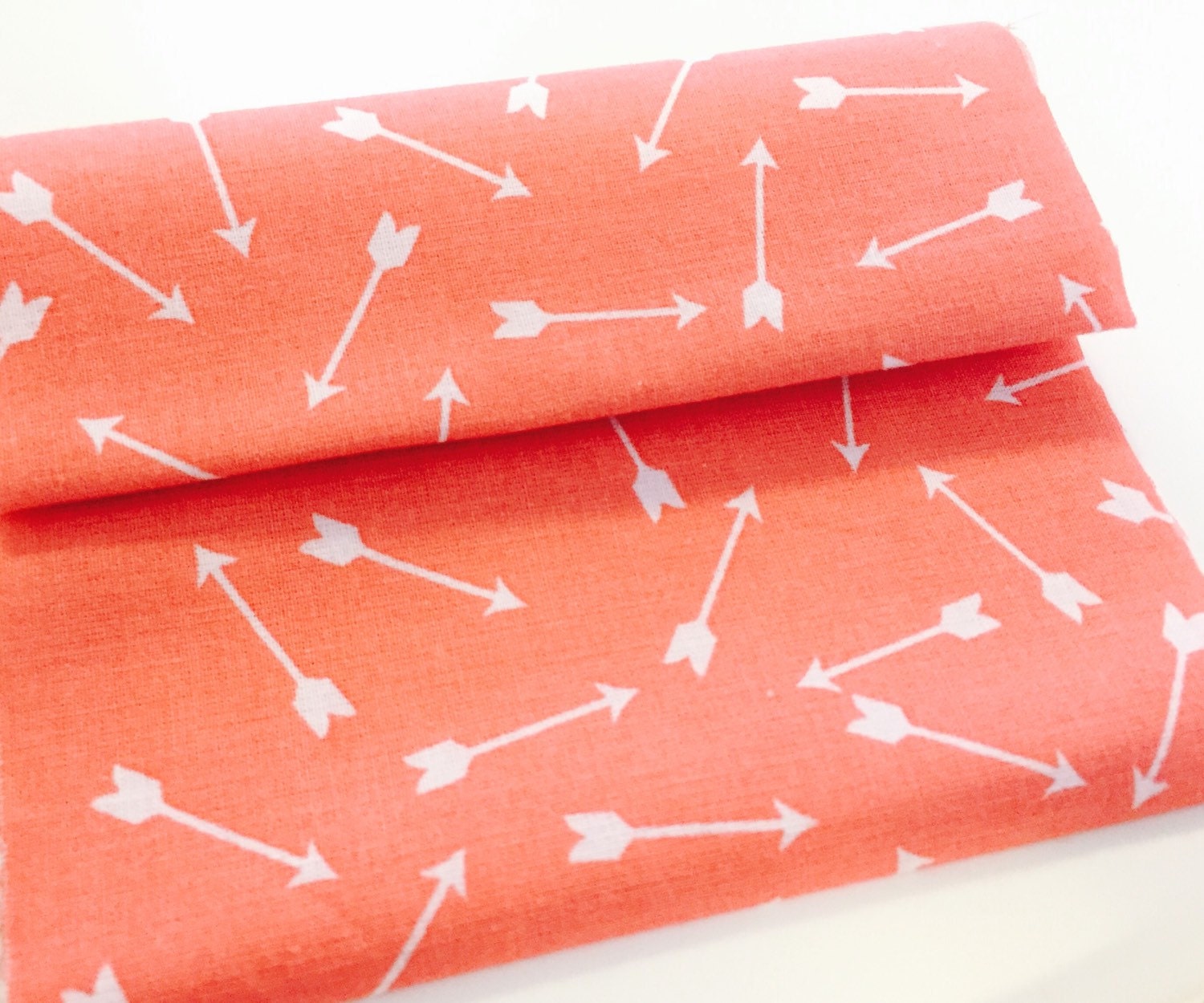Coral Arrow Fabric 100 Cotton Quilting Fabric with White Arrow on