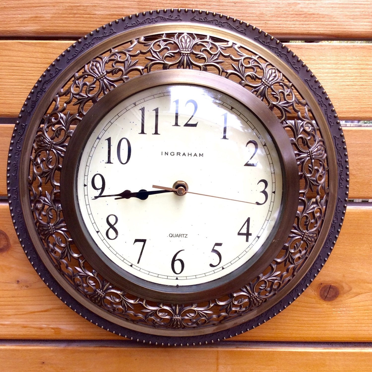 Mid century Ingraham ornate wall clock. Battery operated. Made