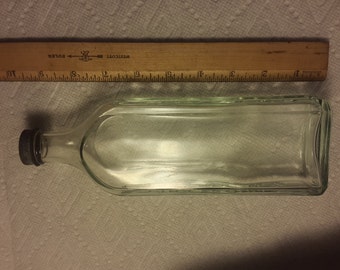 R V Pierce medicine bottle with lid B120
