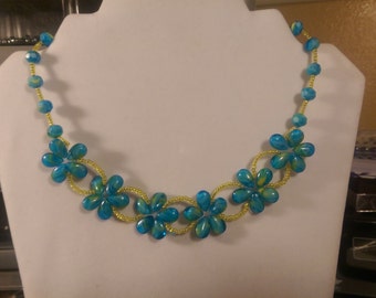 Items similar to Glass Flower Necklace on Etsy