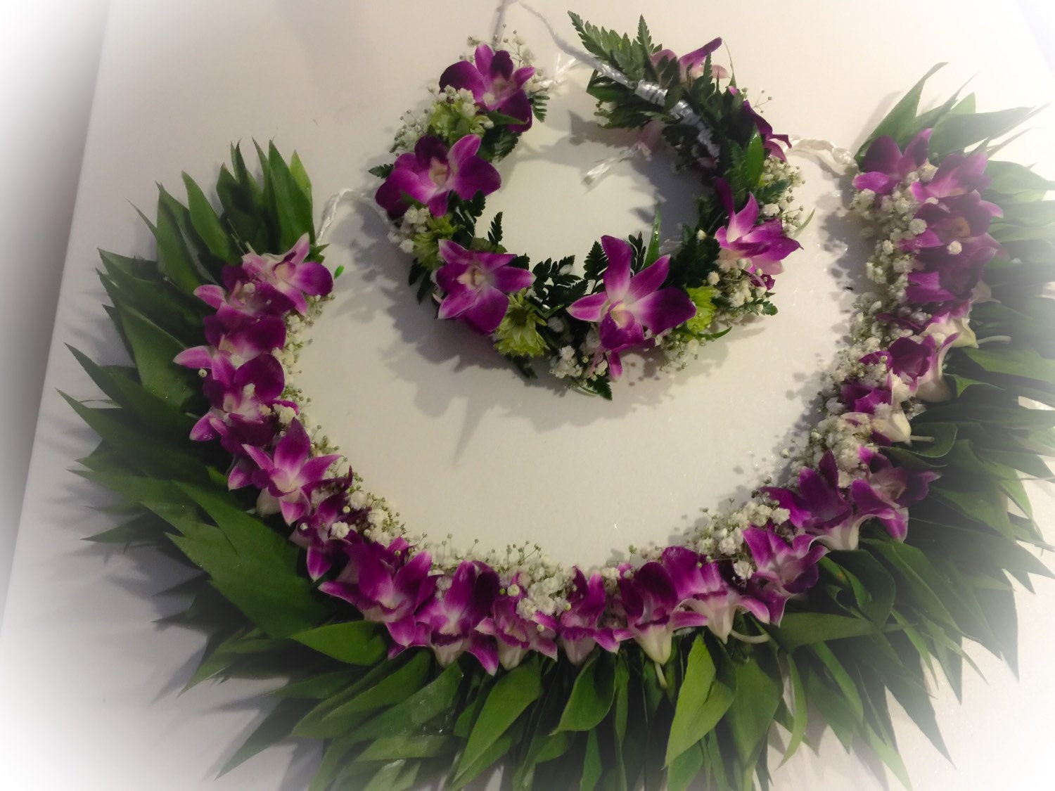 Fresh Ti leaf orchid babys breath lei and haku set