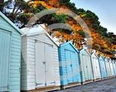 Beach Hut Canvas Print Wall Art. Colourful beach huts on a sunny day. Available in small, medium and large