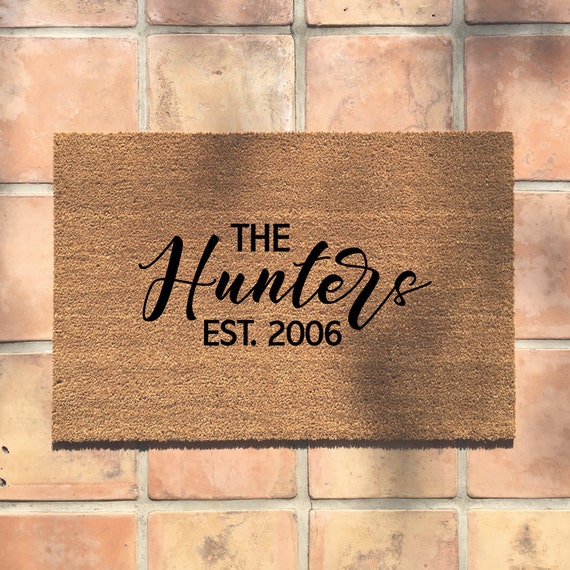 the custom last name doormat personalized by thecheekydoormat
