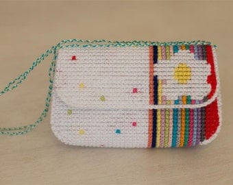 Plastic canvas purse with white flower