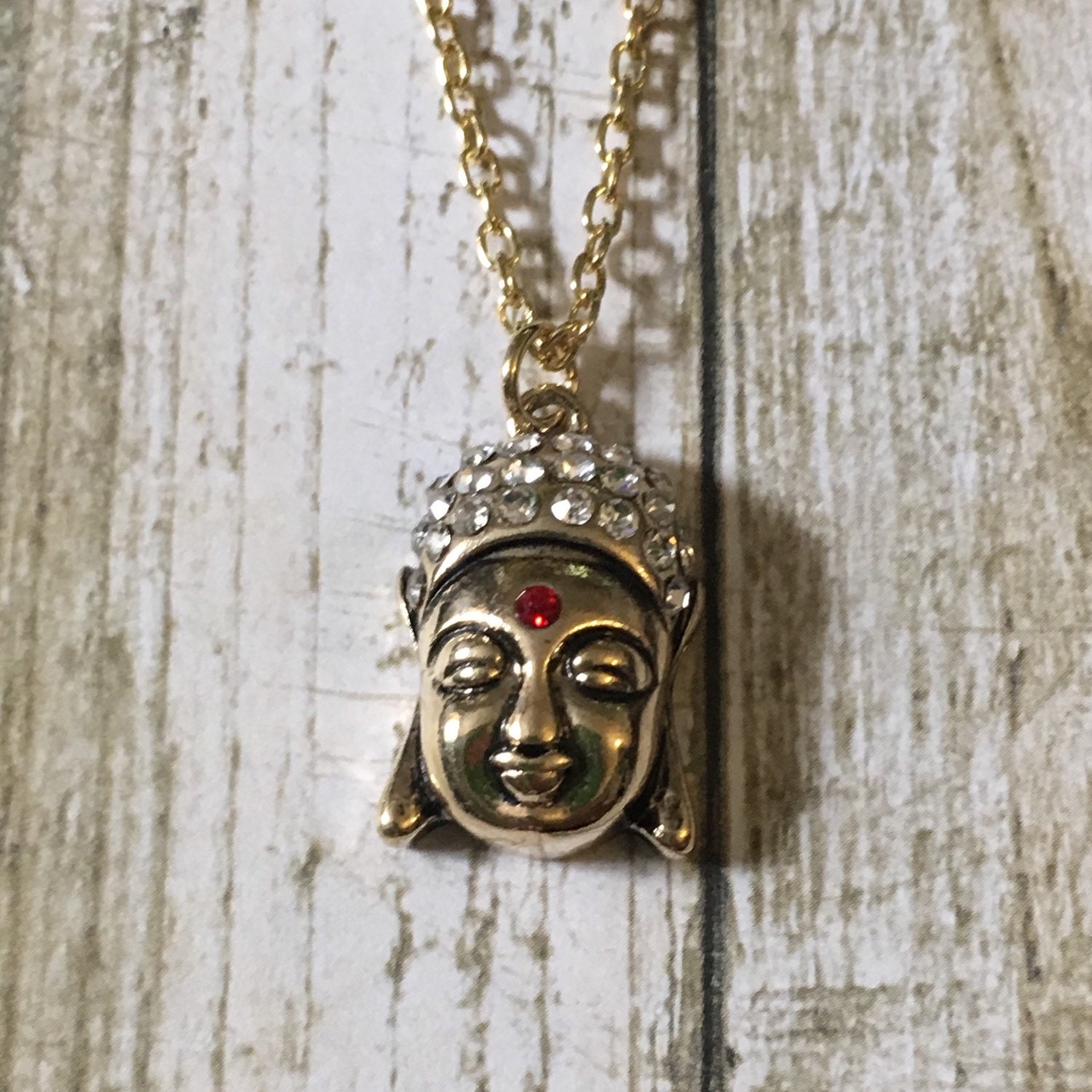 Gold buddha necklace by MGreenhalghDesigns on Etsy