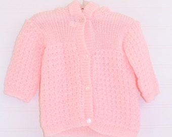 Vintage baby sweater, pink knit with 4 pearly buttons up the front and a hood with a snowball at top, Mon Petit sz Newborn