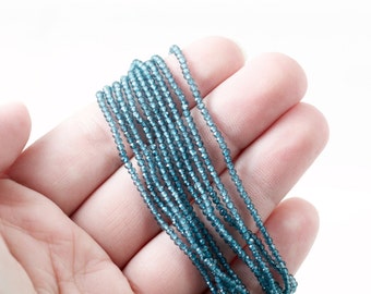 London Blue Topaz 2mm tiny beads gorgeous intense blue color micro faceted ultra shiny sparky amazing quality tiny beads full strand