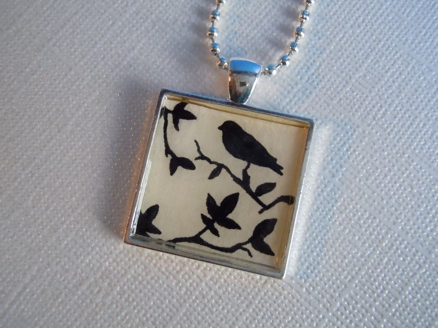 Black Bird Necklace by DayOfTheDollies on Etsy