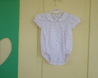 One piece sun suit for baby girl one Mo Old with pink and green flowers