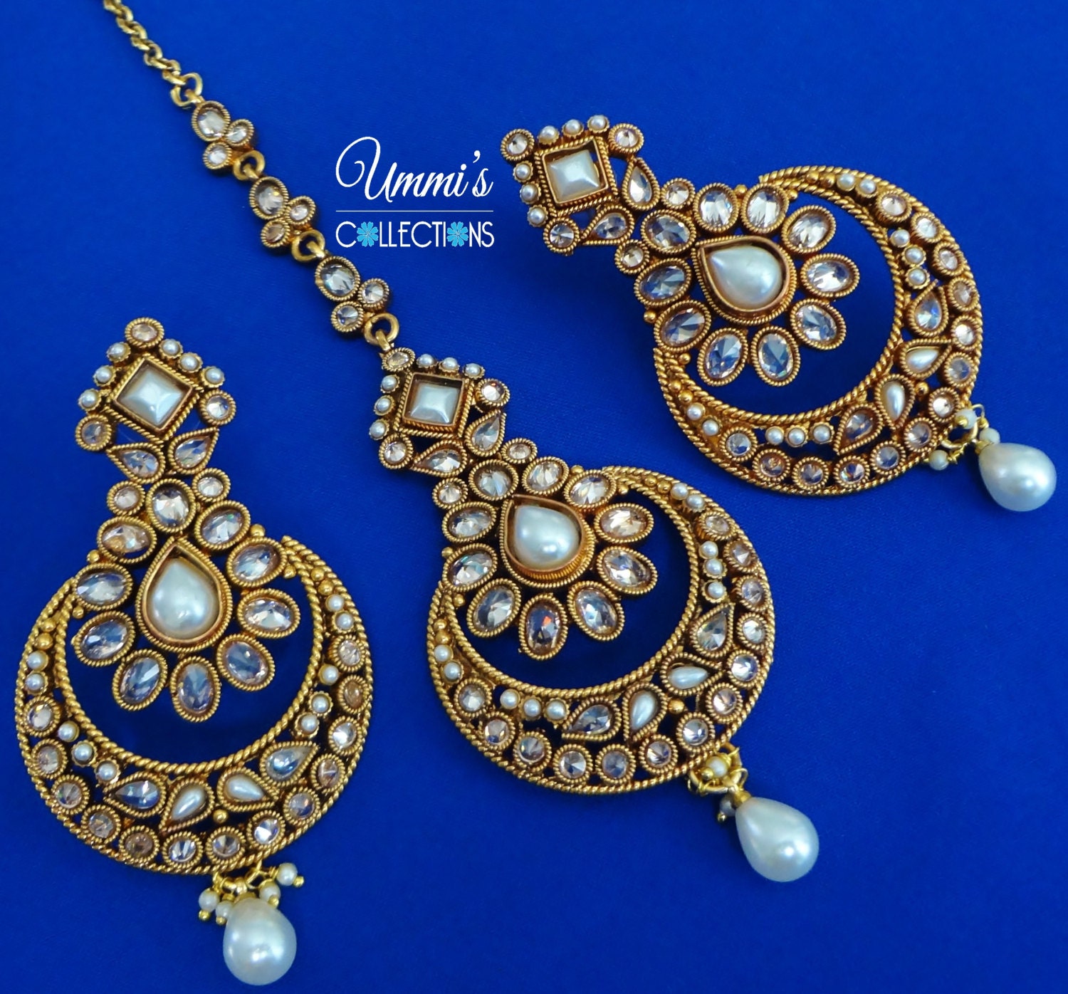 golden maang tikka with earrings