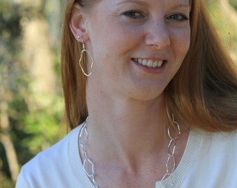 Handmade hammered and twisted earrings. Sparkly and Unique.
