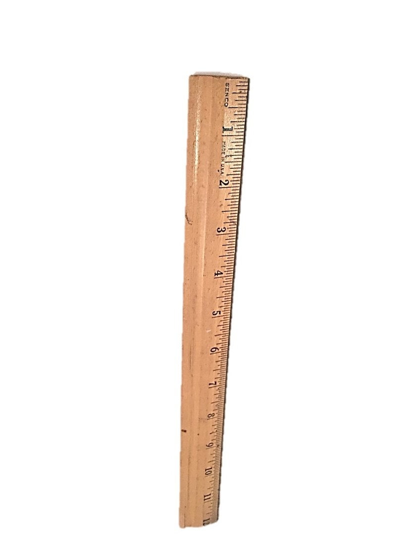 Vintage wooden ruler with metal edge. 12 Inch by 