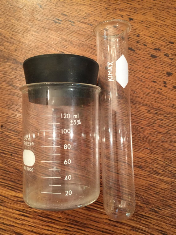 Test Tube And Beaker With Rubber Lid