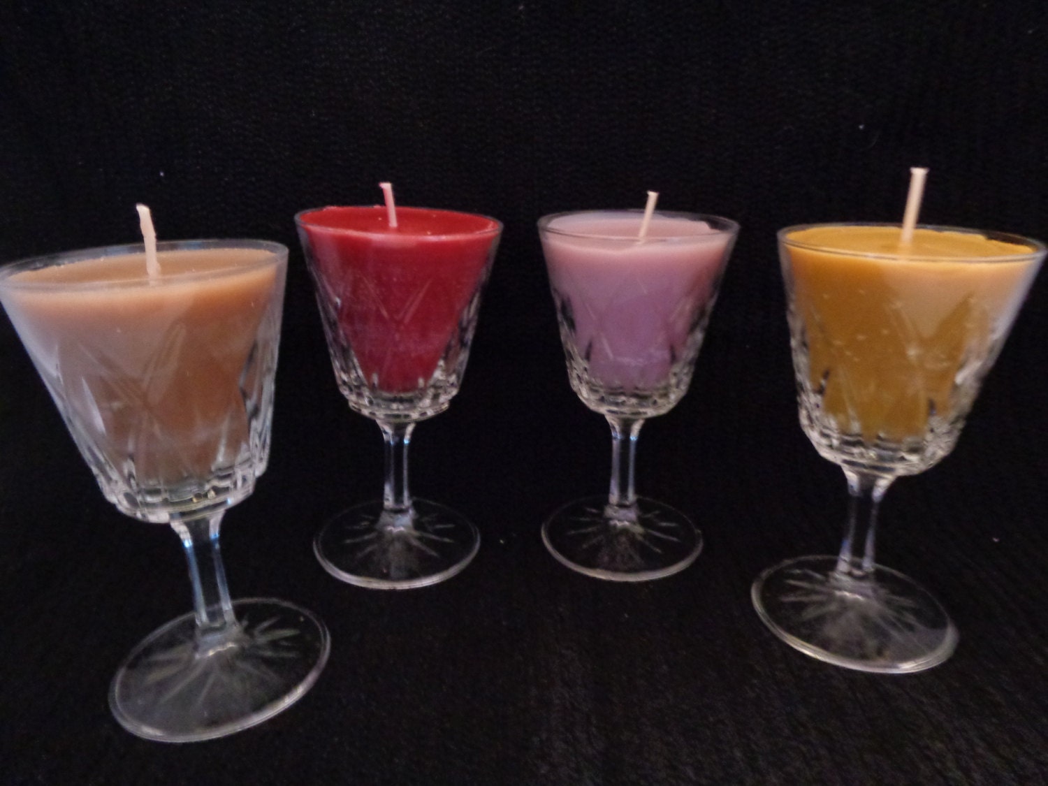 scented candles in sherry glasses