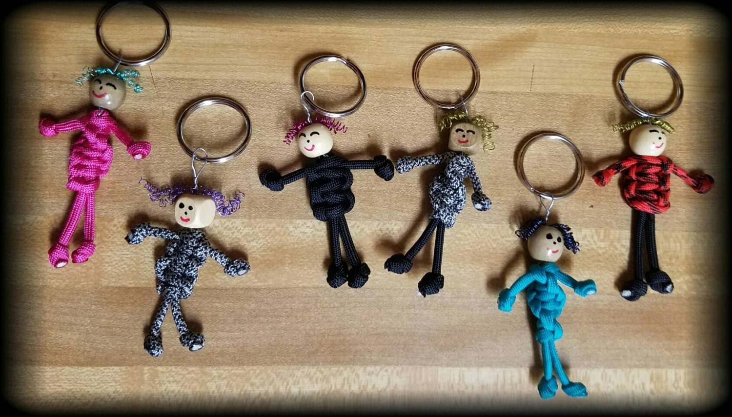 Paracord people keychains and zipper charms by UpcycledGarden1
