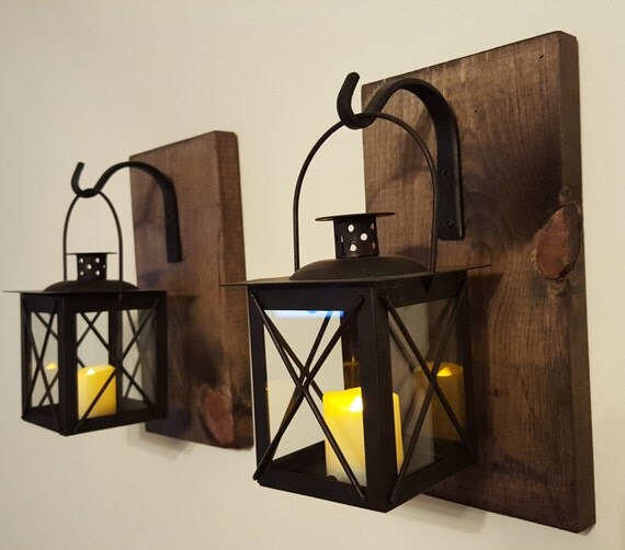 Lantern Pair with wrought iron hooks rustic wood boards