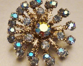 BRIDAL Stunning STARBURST BROOCH Aurora Borealis blue rhinestones app 1 1/2 in diam