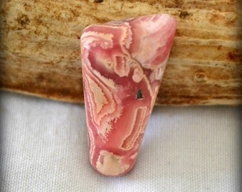 Pink rhodochrosite cabochon. "raspberries and cream" 16.5x36.8x7