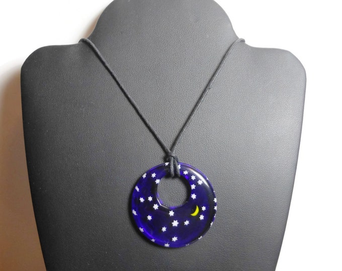 Millefiori glass pendant, 40mm round dark blue with field of stars and a yellow half moon, round go-go on black cord, silver plated findings